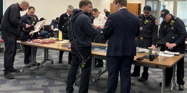 Emergency responders and train safety experts participate in a train derailment tabletop exercise at MDERS training session.